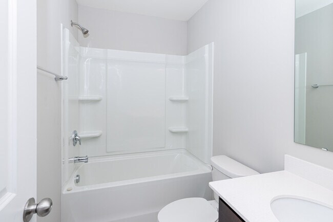 Building Photo - NEW 3 Bedroom Townhome Minutes from Downto...
