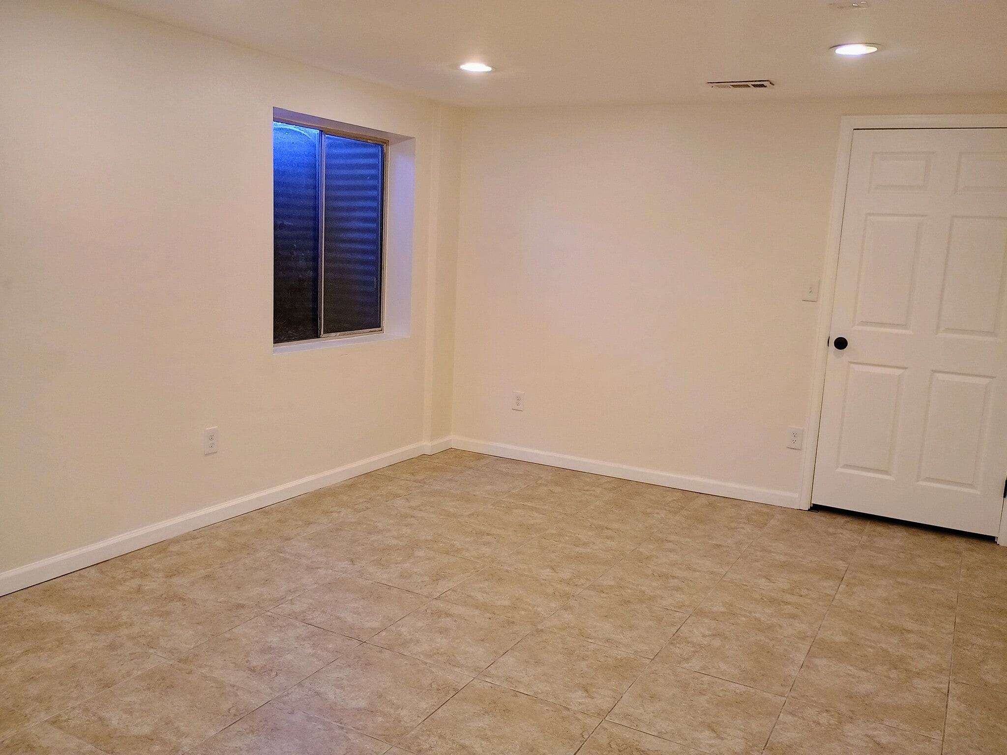 Basement Family Room - 10360 E Jewell Ave