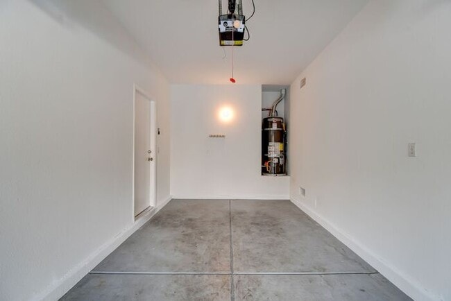 Building Photo - Great home with 4 bedrooms, 2.5 baths. New Floors Paint and Countertops.