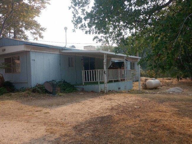 Primary Photo - Red horse front house