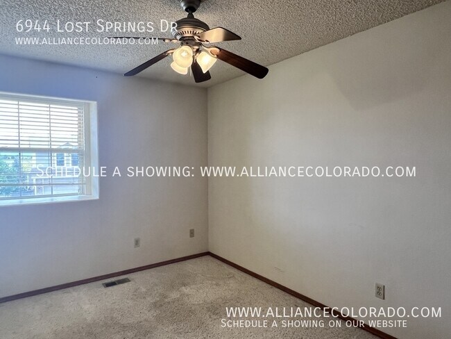 Building Photo - 6944 Lost Springs Dr