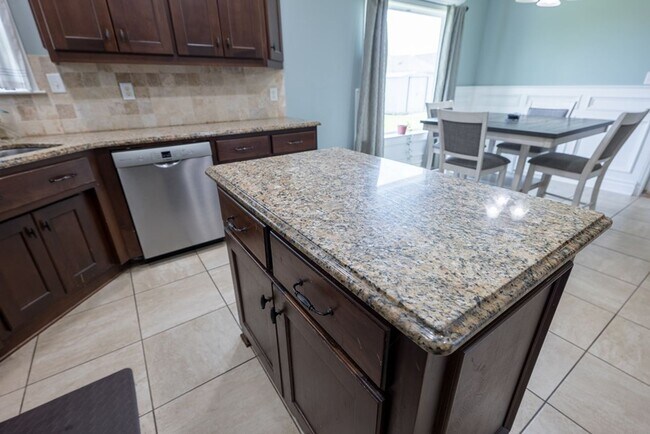 Building Photo - POOL - Elegant 4-Bedroom Home with Fenced Yard