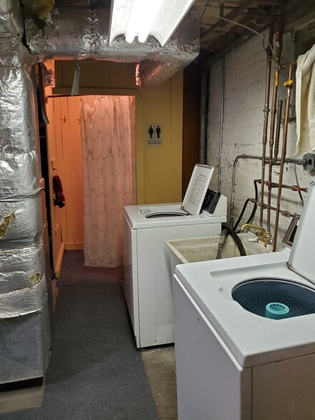 basement laundry 2 washers - 1562 E Irving Plz
