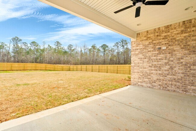 Building Photo - Available now! New Spacious 3 br 2.5 Ba with private 2 car garage, covered patio and fenced in ba...