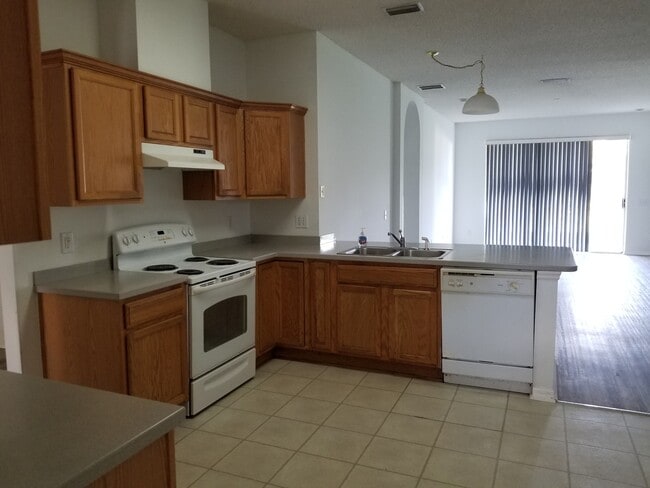 Building Photo - Lovely Four Bedroom with Pond View