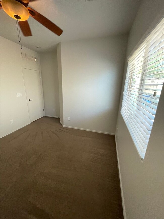 Building Photo - COMING SOON! Fireside at Norterra Spacious...