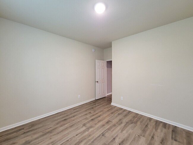 Building Photo - Welcome to this charming one-story home fe...