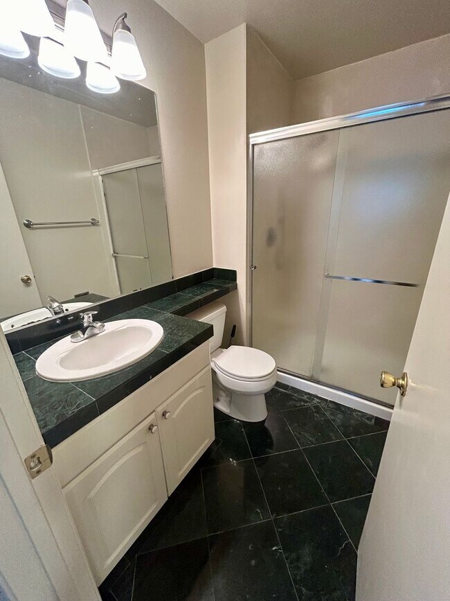 Building Photo - 14205-14211 Doolittle Dr.