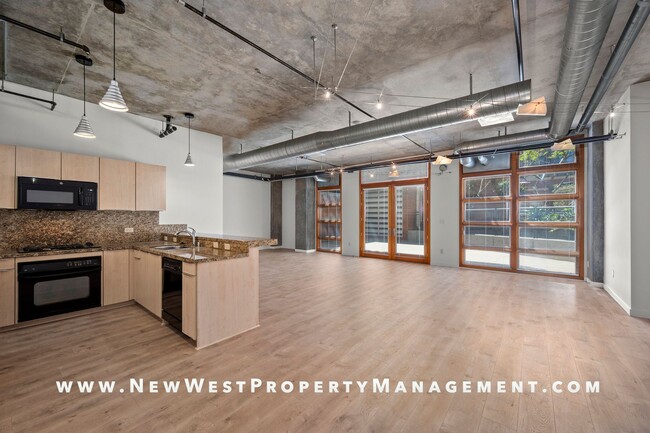 Building Photo - Expansive East Village loft at Parkloft, a...