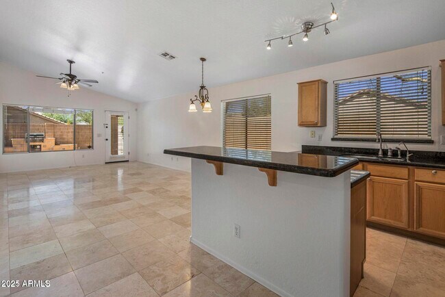 Building Photo - 10307 E Caribbean Ln
