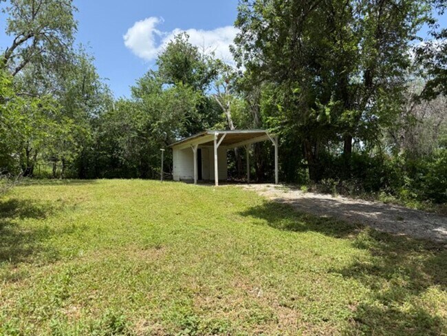 Building Photo - Charming 3-Bedroom Home with Hardwood Floors & Spacious Backyard