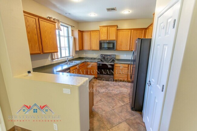 Building Photo - 9136 W Meadow Dr