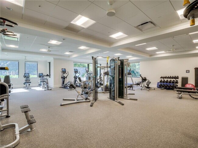 Building Photo - Turnkey 2-bedroom plus den villa, perfectly situated to capture stunning golf course and lake vie...