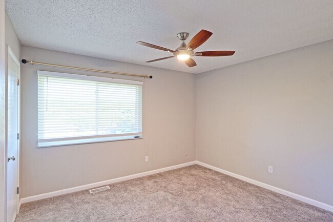 Building Photo - Spacious 3-Bedroom Attached Villa with Finished Basement & Private Fenced Yard!