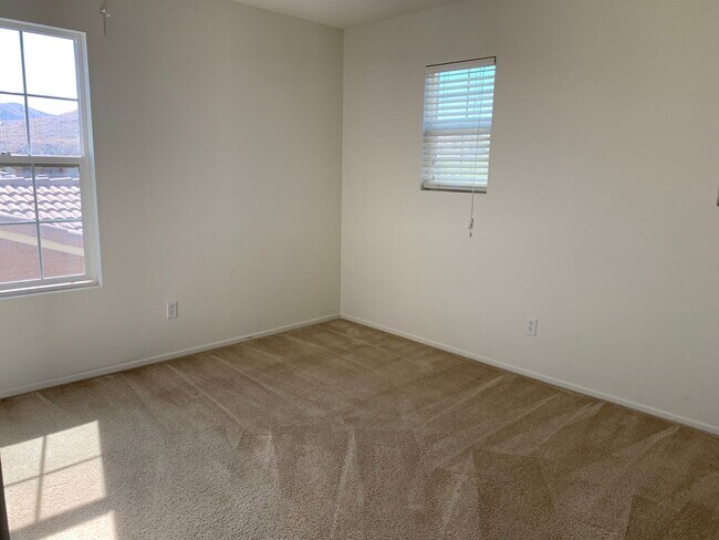 Building Photo - SOLAR HOME * CORNER HOUSE * HUGE BACK YARD * NICE PERRIS HOME.