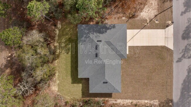 Building Photo - 9461 N Sandree Dr