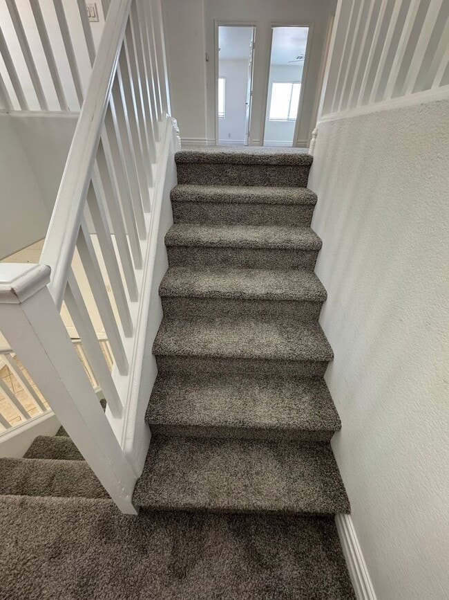 Building Photo - STUNNING 2 STORY HOME IN A GUARD GATED COM...