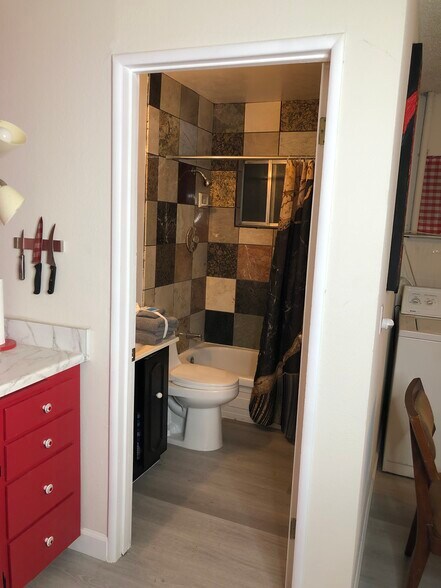 Small bathroom Full Tub and shower - 5430 Stacey Ave
