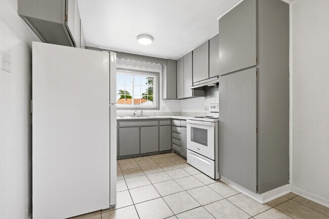 Building Photo - Charming 4-Bedroom with 2 Baths and Finished Basement!