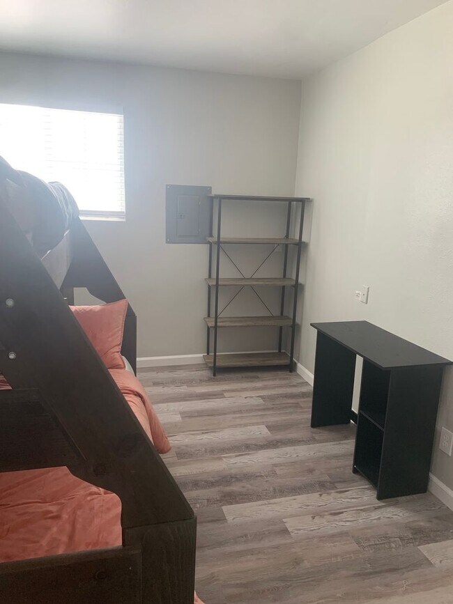 Building Photo - Furnished, Upstairs Apartment with 2 bedrooms and 1 bathroom. Utilities Included!!