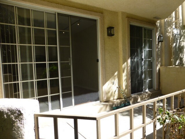Building Photo - COMING SOON! 2-Bedroom Condo with some Uti...
