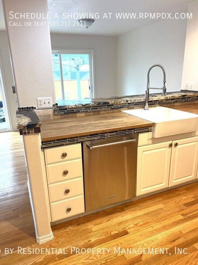 Building Photo - 6463 NW Wenmarie Dr