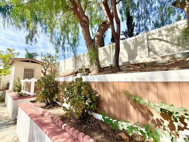 Building Photo - Spacious 5 Bedroom 3 Bathroom Home with Updated Paint, New Roof & Private Balcony