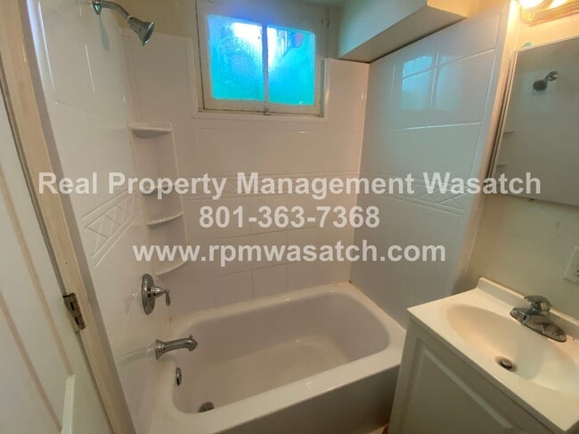 Building Photo - Come See this 2 bedroom 1 bath basement apartment in Salt Lake City With $500 Off First Month Rent1!