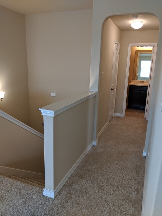 Hallway to 5th bedroom and 3rd bathroom - 13029 Cadenza Crk