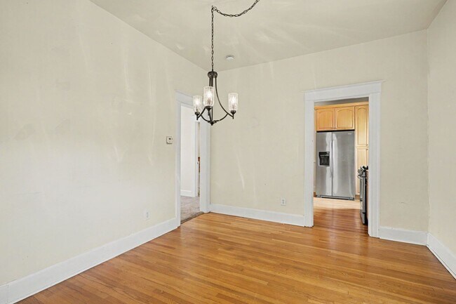 Building Photo - Beautifully Preserved Englewood Home with Fenced Backyard