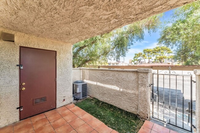 Building Photo - Modern Gated Condo Near the Strip with Pool & Covered Parking!
