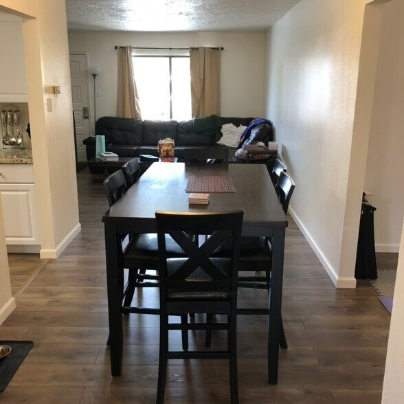 Dining looking into 1st living space (furnishings not included) - 808 La Veta Dr NE