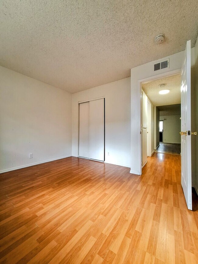 Building Photo - Beautiful 2bd Condo In Gated Community With Pool, Gym, and On-site Laundry