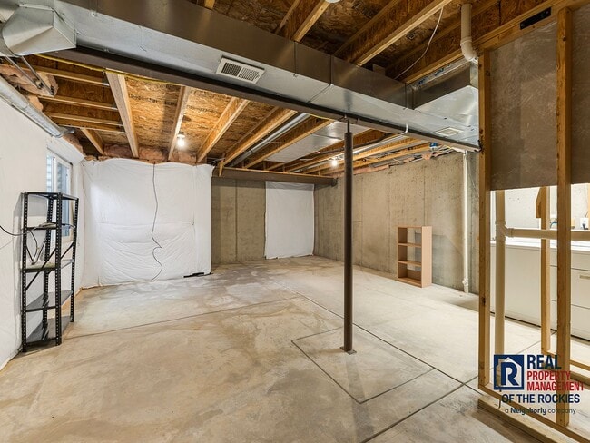 Building Photo - Fort Collins Townhouse with Vaulted Ceilin...