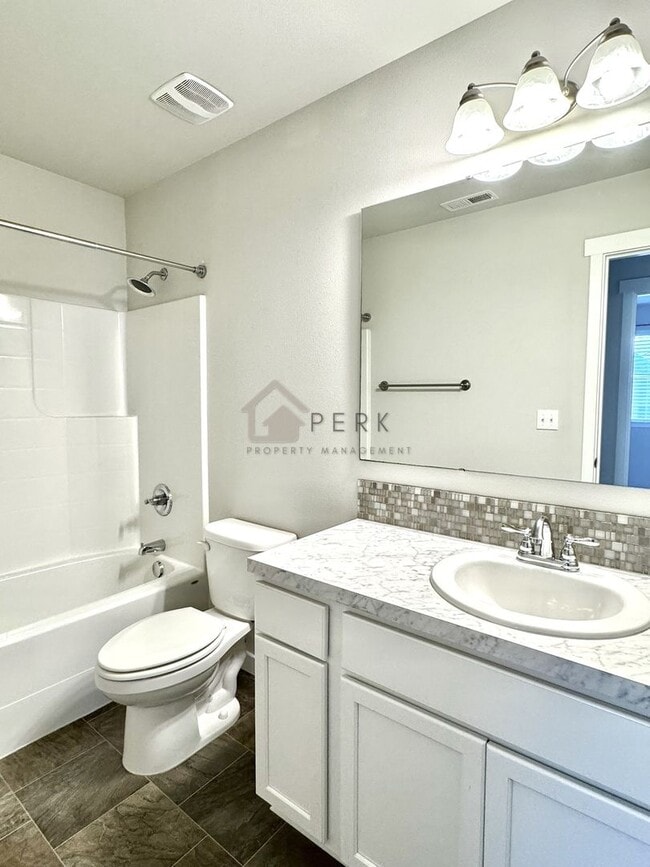 Building Photo - Modern 4-Bedroom, 2.5-Bath, 3-Story Home in Gated South Hill Community