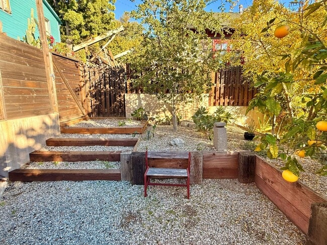 Building Photo - Hilltop Highland Park Sanctuary with Views, Private Gated Yard, In Unit Laundry, Parking & Abunda...