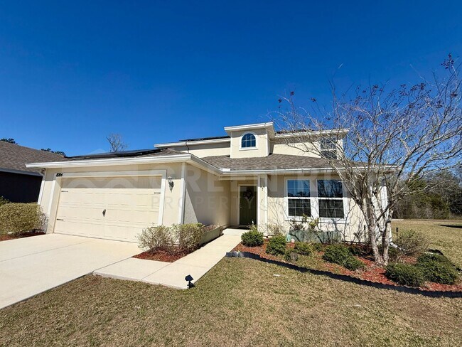 Building Photo - Room to Live, Space to Thrive! Stunning 6BR Home with Solar, Upgrades & Screened Lanai in Macclen...