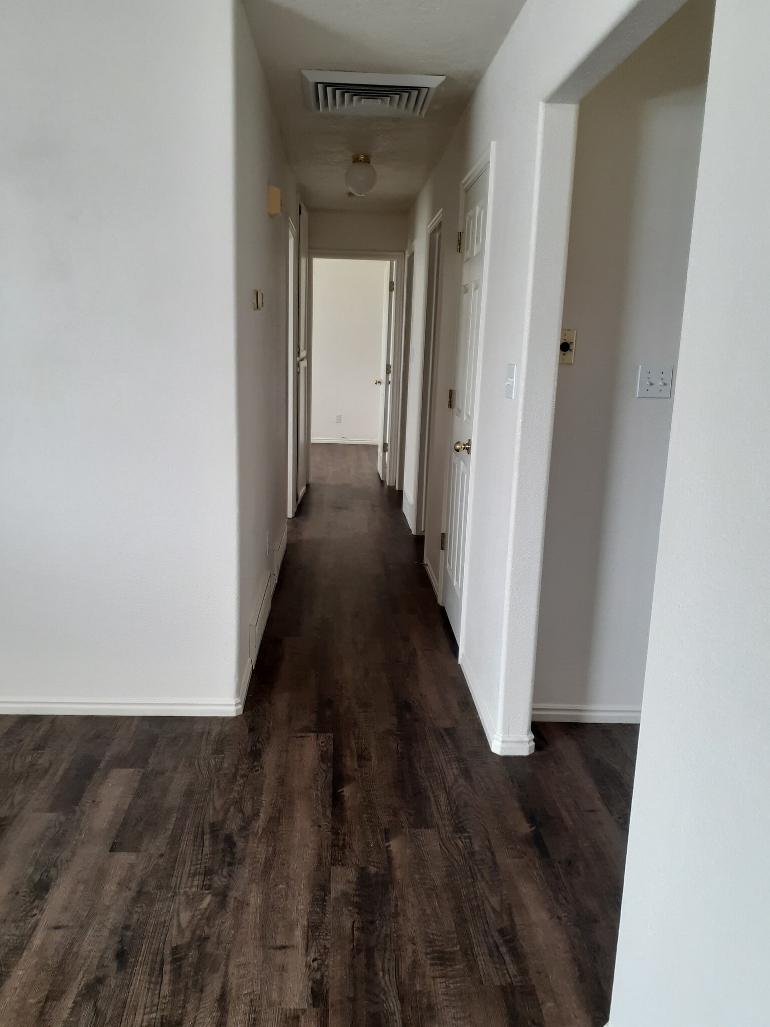 Hall to 3 bedrooms and bathroom - 4616 N Tumbleweed Dr