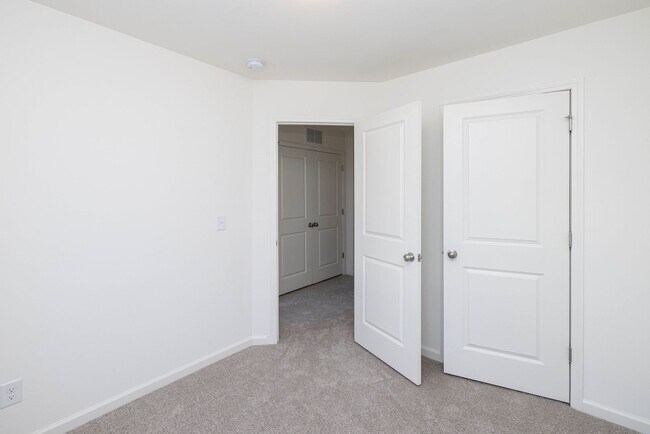 Building Photo - 3 Bedroom Townhome Minutes from Downtown Oakboro - Available August 2026