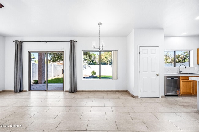 Building Photo - 9054 W Custer Ln