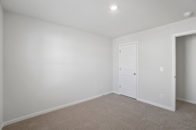 Building Photo - 4BR Home in The Pines at Paw Creek – New Construction + Private Deck