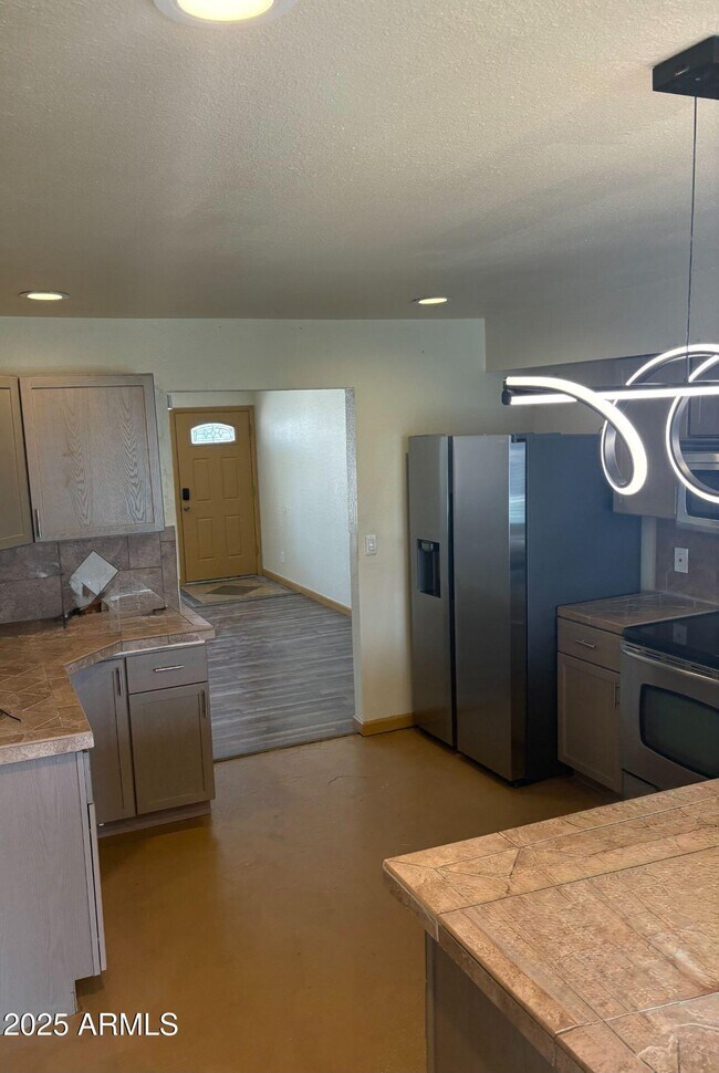 Building Photo - 4027 E Windrose Dr