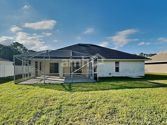 Building Photo - 5869 NW Leghorn Ave