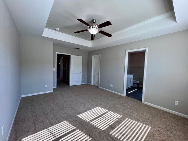 Building Photo - 3 bed/2.5 bath at end unit townhome in Berkeley Walk at Savannah Quarters with garage