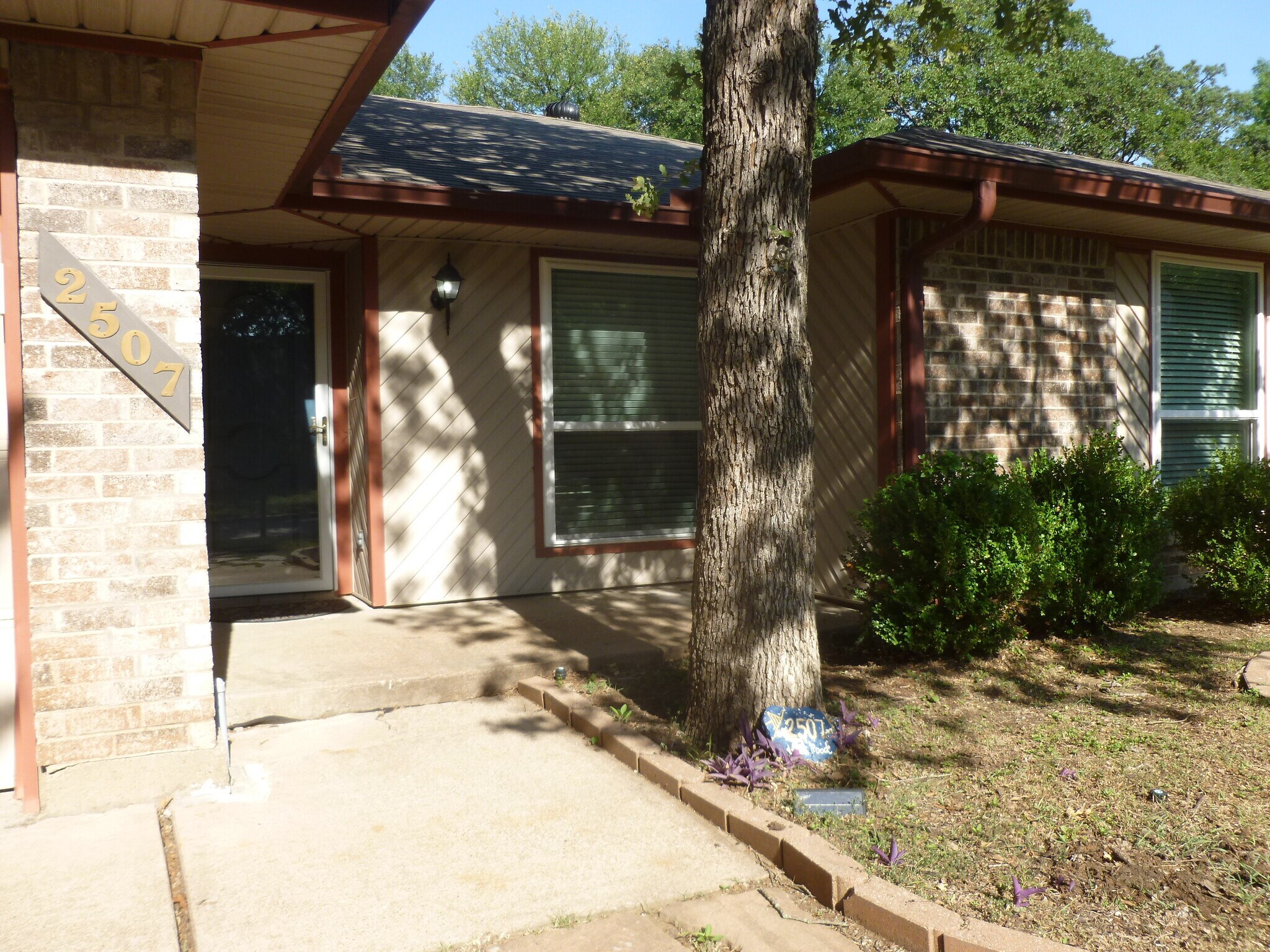 This property is set off a quiet neighborhood street, nestled in a grove of oak trees. It's an encla - 2507 Holt Road