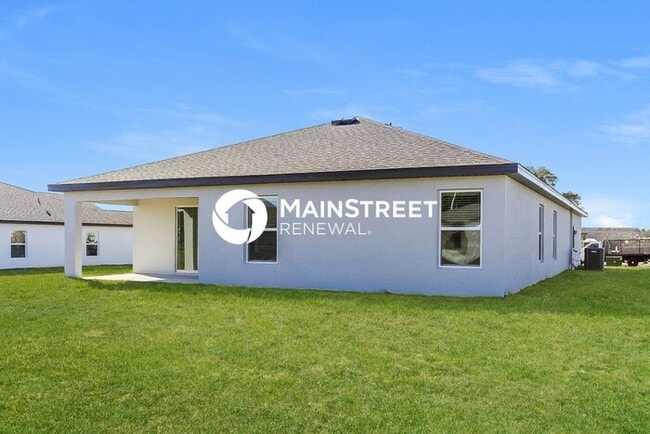 Building Photo - 4 Bedroom Pet-Friendly Home in Mascotte, FL with Main Street Renewal
