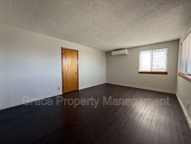 Building Photo - 1149 E 58th Ave