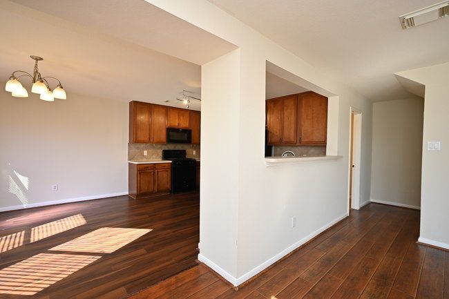 Building Photo - 9403 Coatsworth Dr