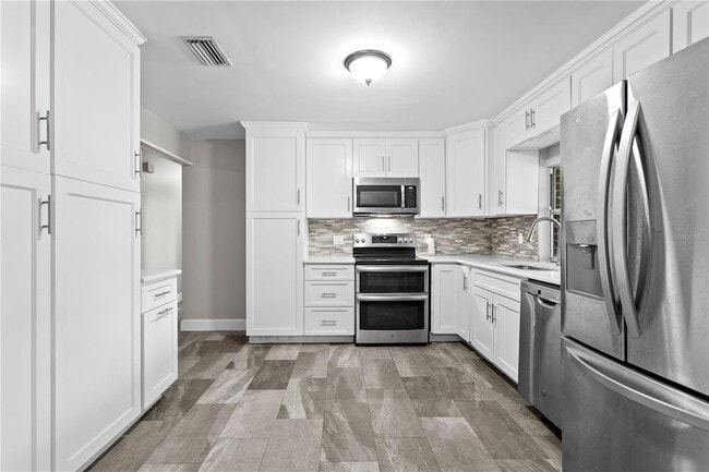 Building Photo - 6928 Greenhill Pl