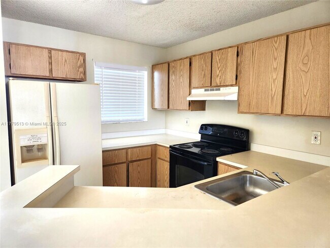 Building Photo - 8730 N Sherman Cir